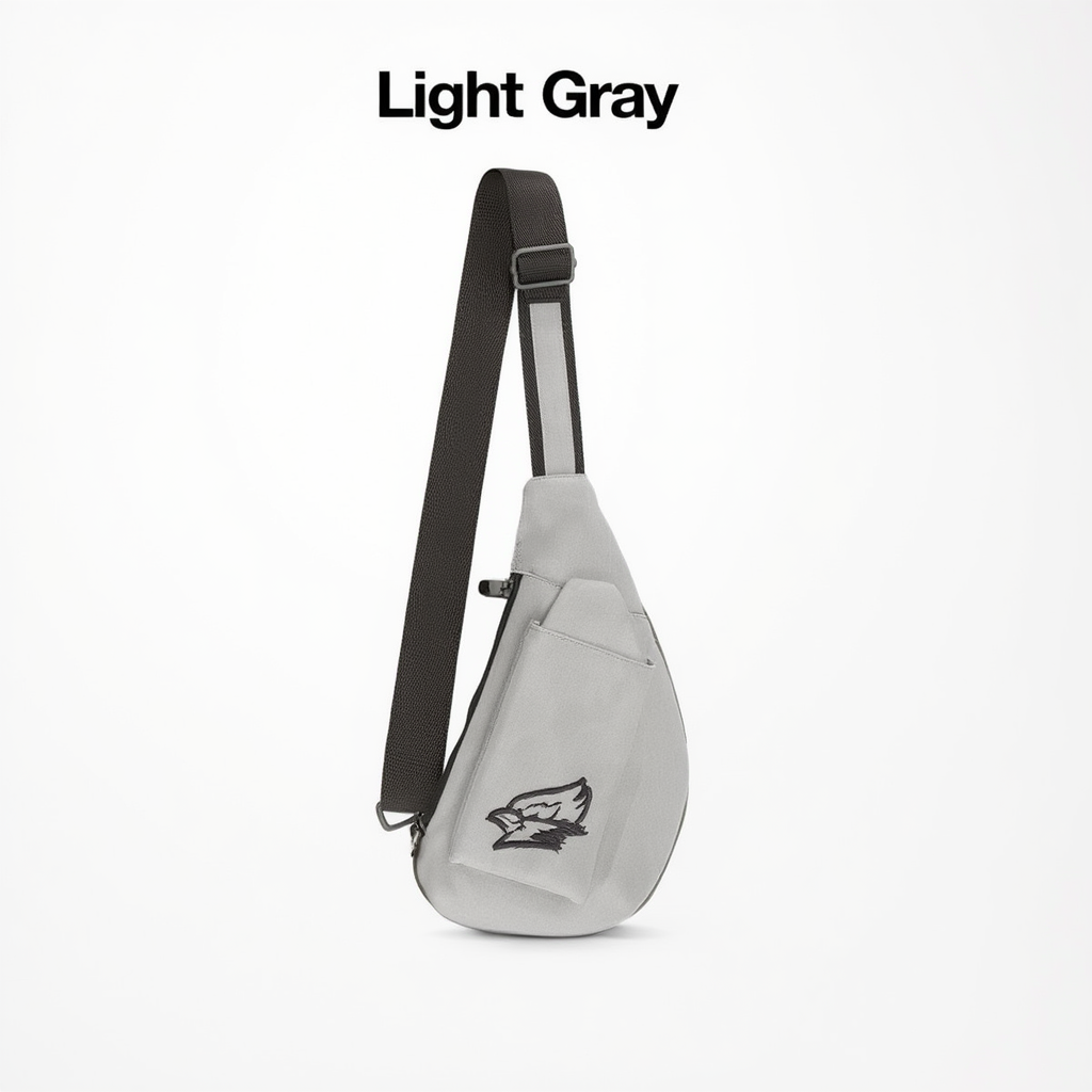 Light gray sling bag with black strap on a white background