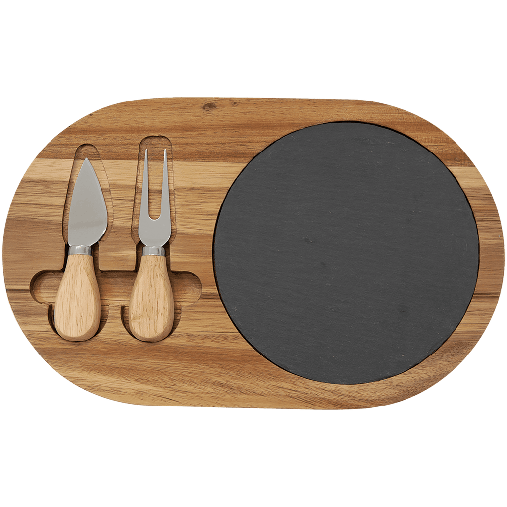 Wooden cheese board with black slate surface and two wooden utensils on a transparent background