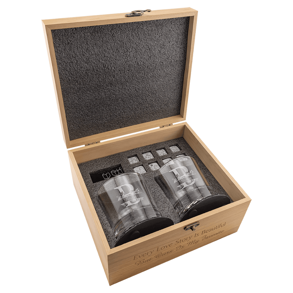 Wooden box with two glass tumblers and a digital clock inside.