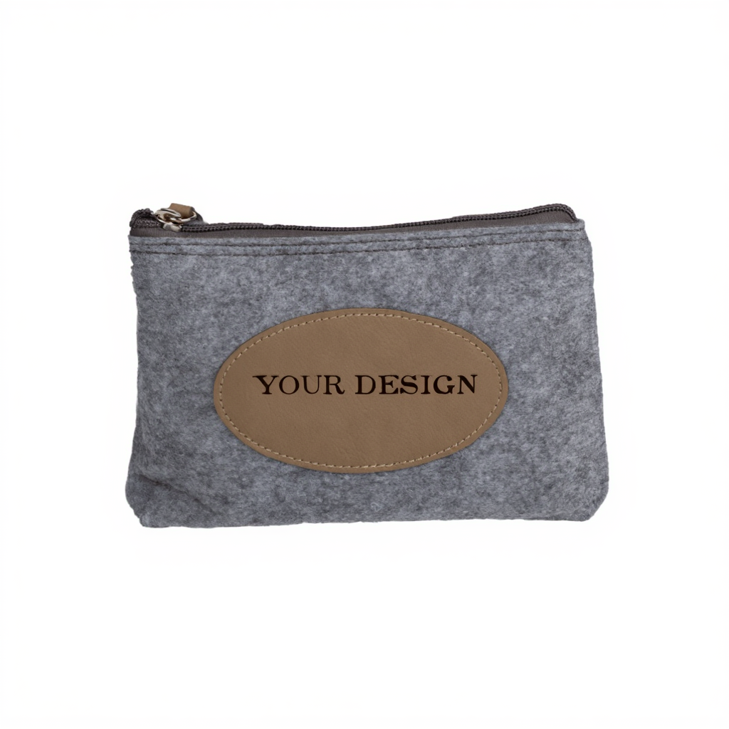 Gray pouch with brown leather patch and 'Your Design' text on a white background